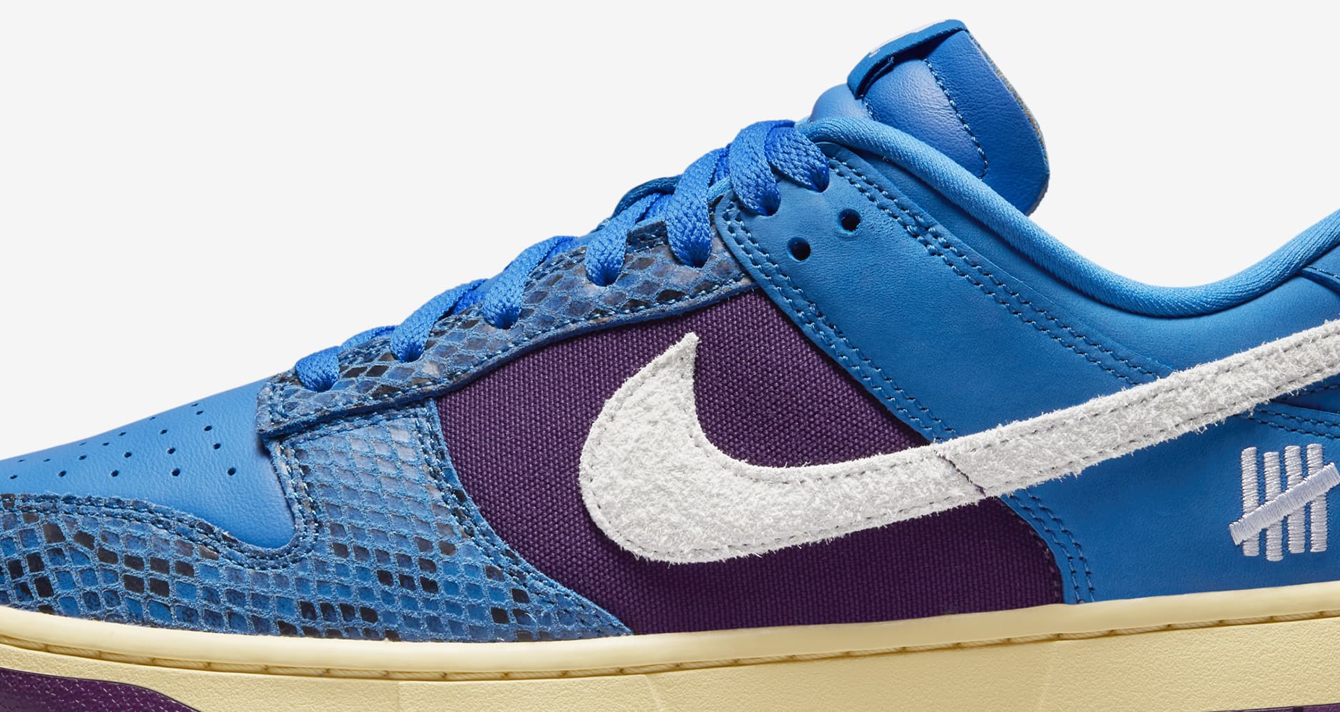 5 on it dunk low x undefeated